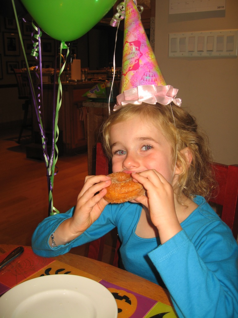 102610_LEnjoyingBdayDonutBlog.jpg